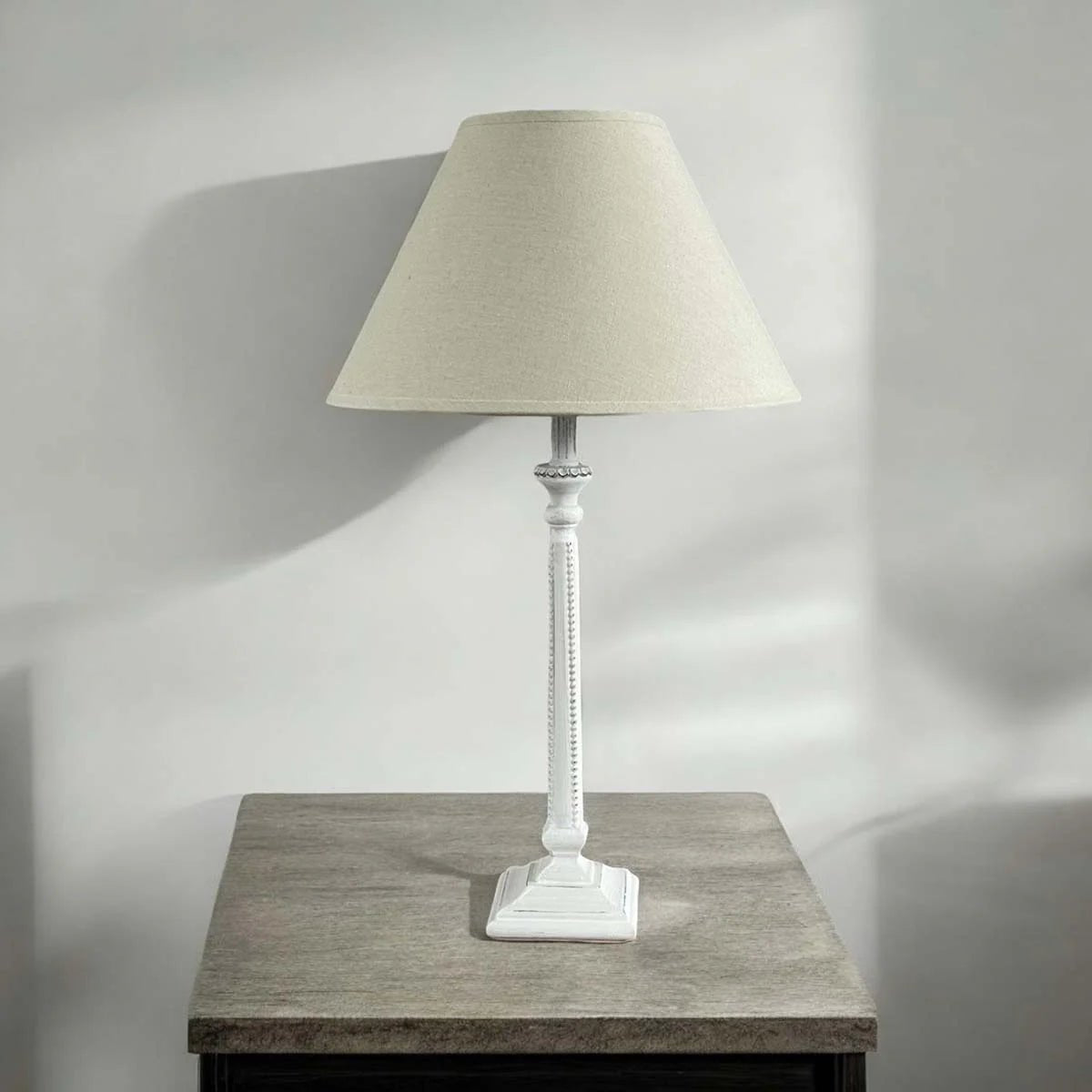 Ivory beaded base and natural shade