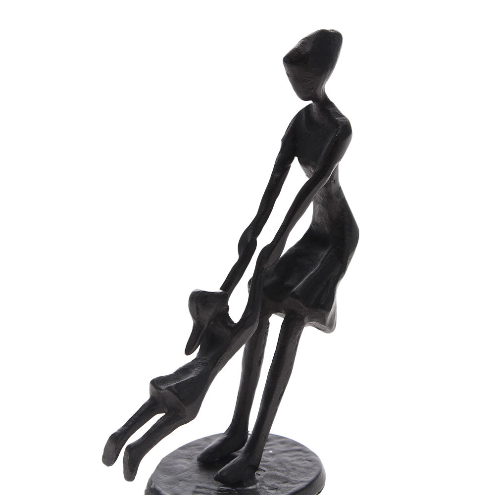 Mother Spinning Child Sculpture