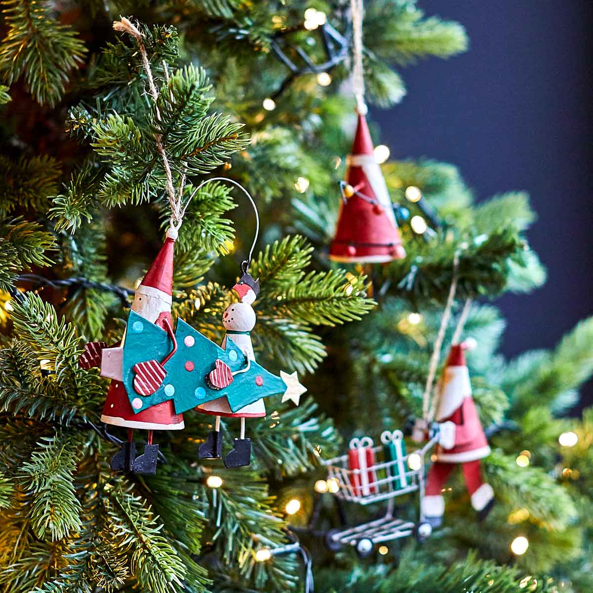 Santa and Snowman Carrying the Tree