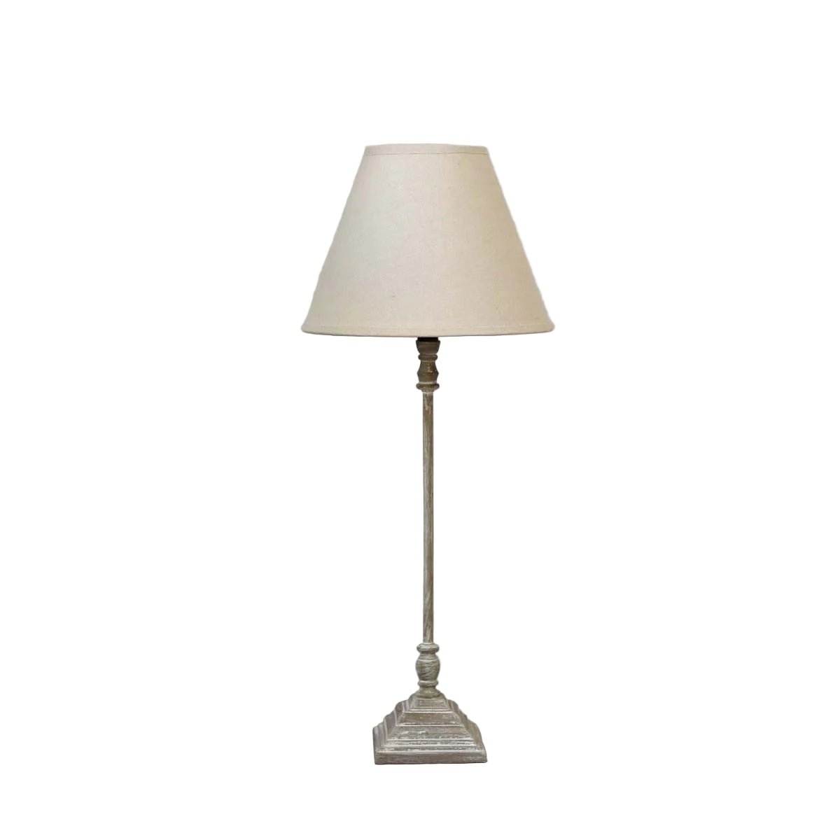Thin stem table lamp with natural shade