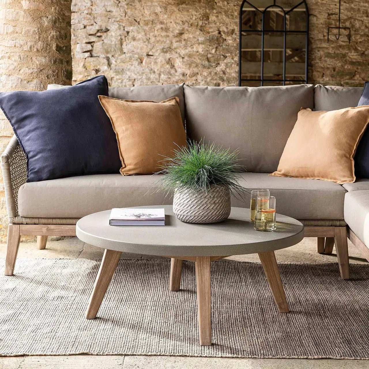 Elevate Your Living Room with a Pouffe and Coffee Table Combo - Angela Reed