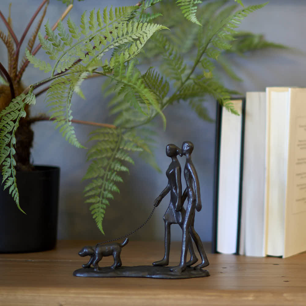 Dog Walking Couple Sculpture