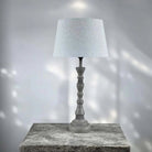 Garaffe table lamp with natural shade