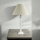 Ivory beaded base and natural shade