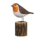 Robin Carving on a Log