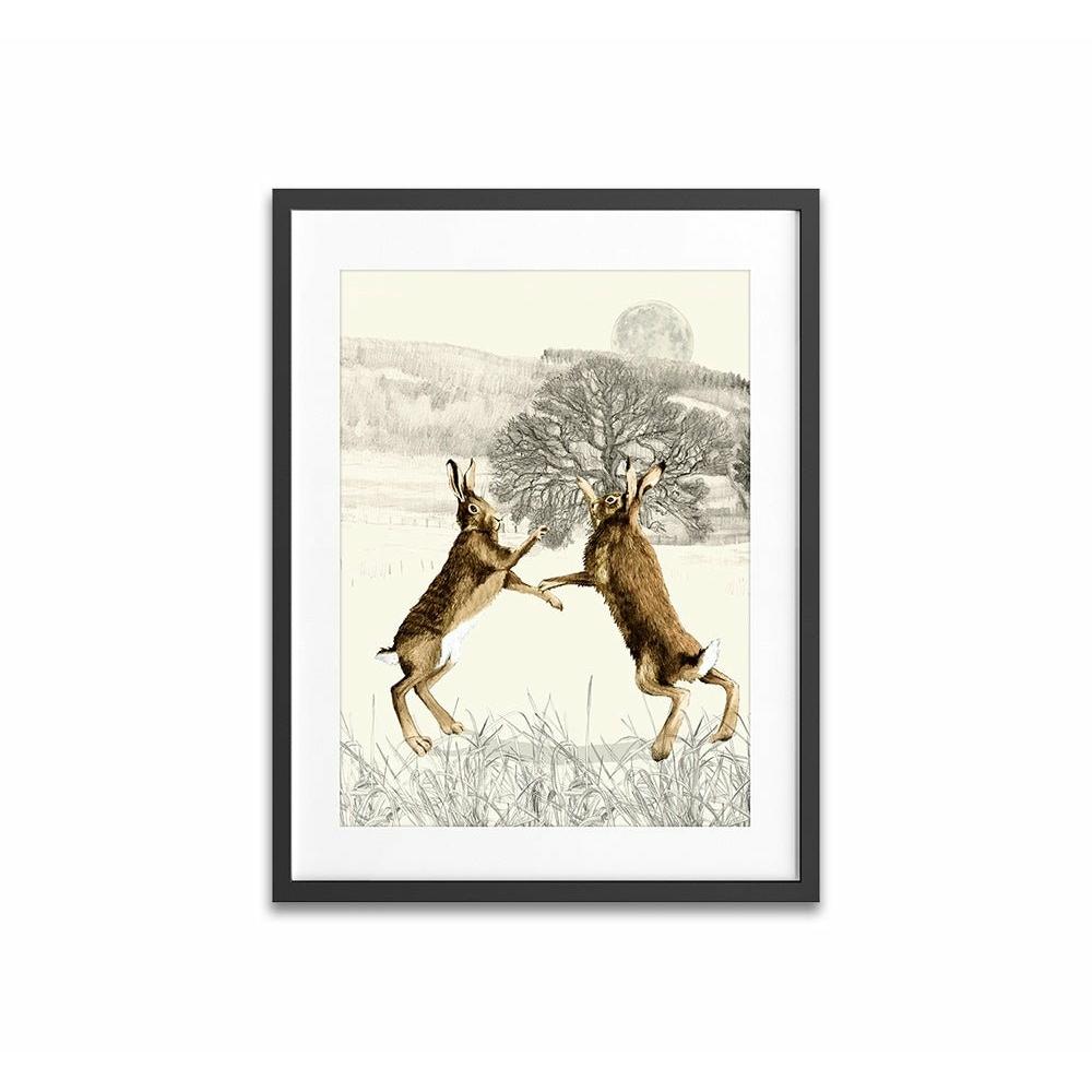 Boxing Hares framed Print
